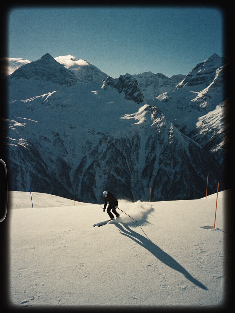 Snowy landscape above Courchevel, ski tracks in untouched powder
